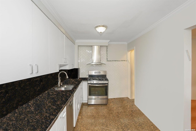 kitchen featuring white cabinets, wall chimney range hood, crown molding, sink, and appliances with stainless steel finishes