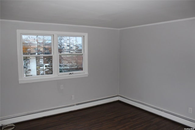 unfurnished room with hardwood / wood-style flooring, ornamental molding, and baseboard heating