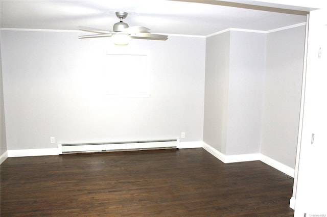 empty room with dark hardwood / wood-style floors, baseboard heating, ornamental molding, and ceiling fan