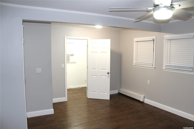 empty room with ceiling fan, dark hardwood / wood-style floors, ornamental molding, and a baseboard radiator