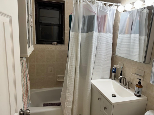 bathroom featuring decorative backsplash, vanity, and shower / bathtub combination with curtain