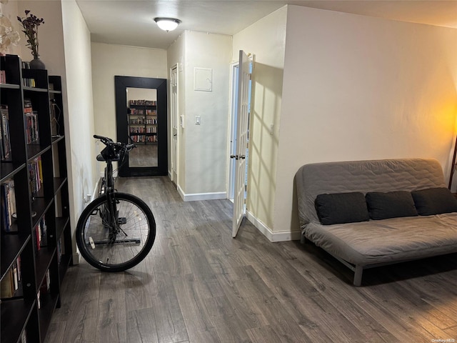 sitting room with hardwood / wood-style floors