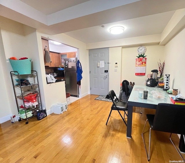 dining space featuring light hardwood / wood-style floors