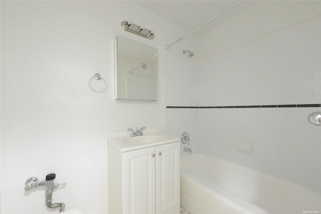 bathroom featuring vanity and tiled shower / bath combo