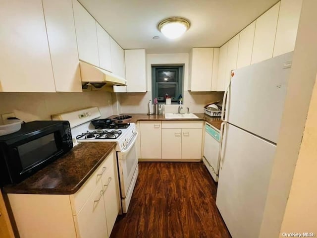 kitchen with white appliances, white cabinetry, dark wood-type flooring, and custom exhaust hood