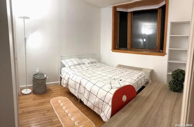 bedroom featuring hardwood / wood-style floors