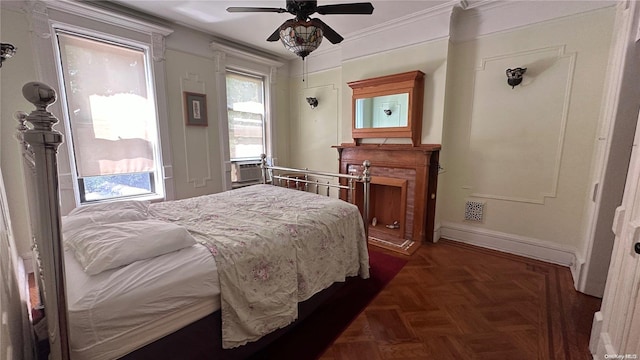 bedroom featuring dark parquet flooring, ceiling fan, cooling unit, and ornamental molding