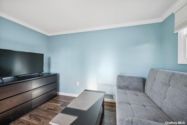 living room with crown molding and dark wood-type flooring