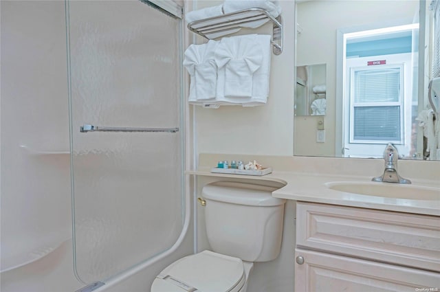 full bathroom featuring vanity, toilet, and shower / washtub combination