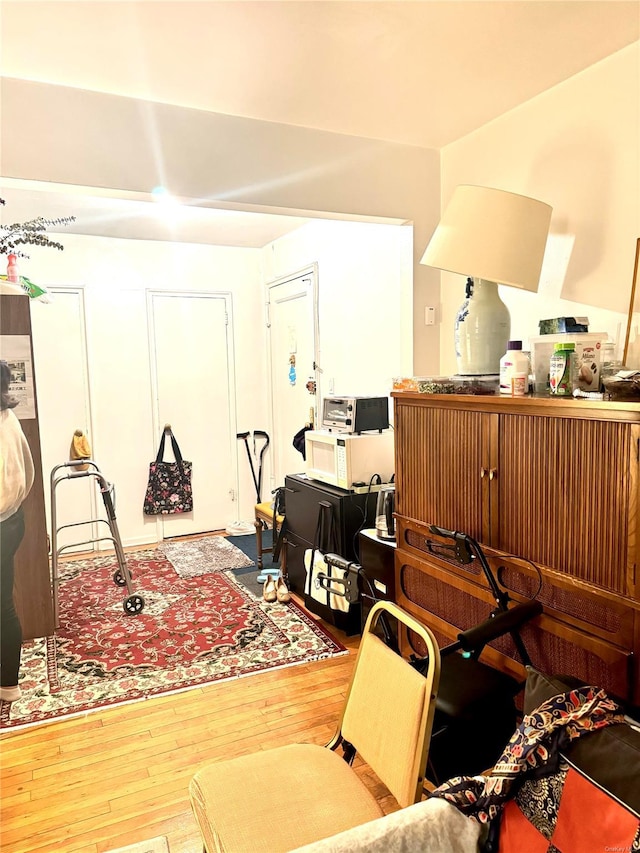 miscellaneous room featuring wood-type flooring