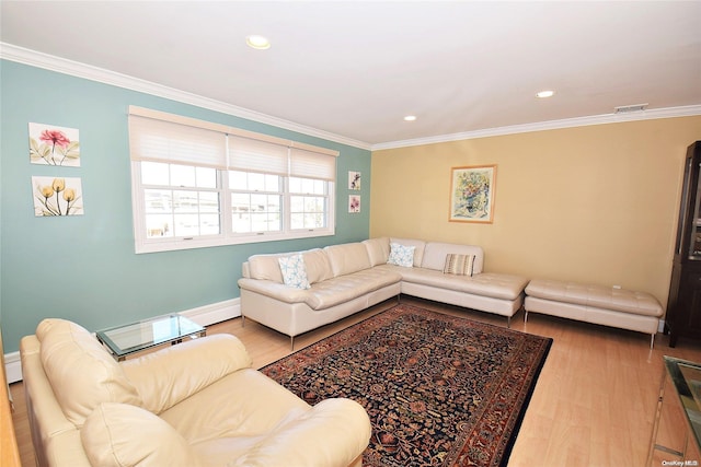1070 Mckinley St, Baldwin, NY 11510 - living room with ornamental molding, wood finished floors, recessed lighting, and baseboards