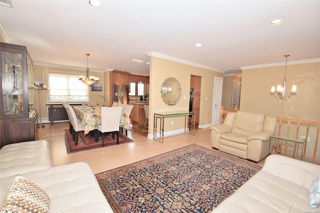 1070 Mckinley St, Baldwin, NY 11510 - living room featuring a chandelier, ornamental molding, recessed lighting, baseboards, and light wood-style floors