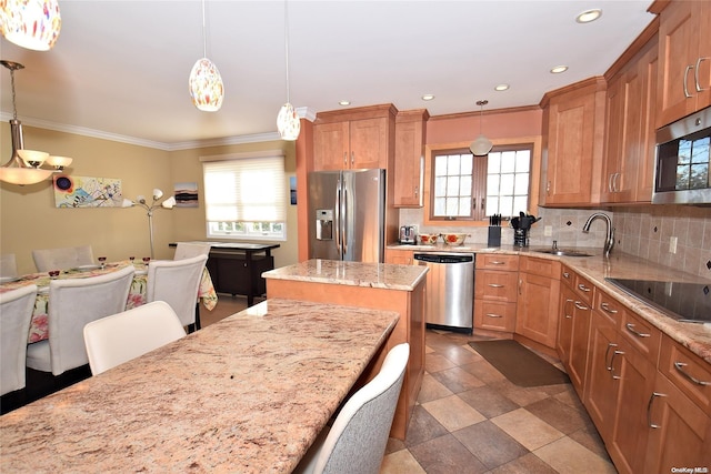 1070 Mckinley St, Baldwin, NY 11510 - kitchen with stainless steel appliances, a sink, crown molding, plenty of natural light, and backsplash