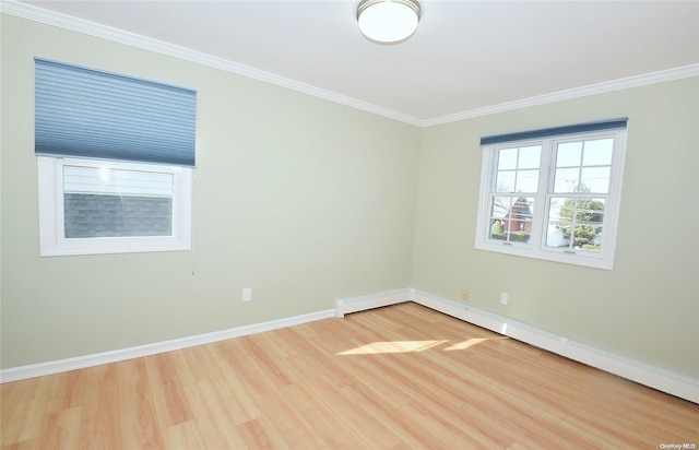 1070 Mckinley St, Baldwin, NY 11510 - unfurnished room with light wood-type flooring, baseboards, ornamental molding, and a baseboard radiator