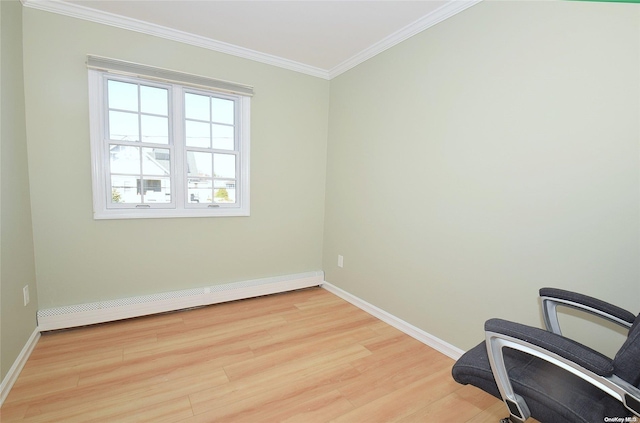 1070 Mckinley St, Baldwin, NY 11510 - spare room featuring a baseboard heating unit, light wood-style floors, baseboards, and crown molding