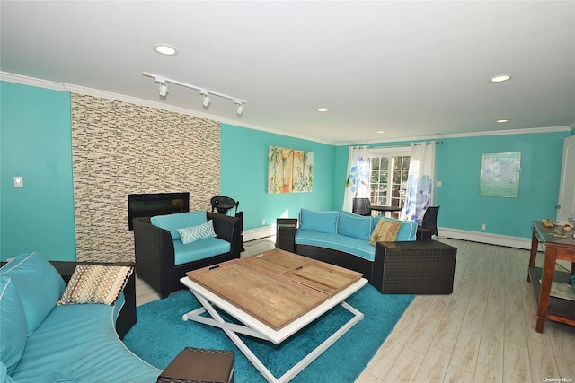 1070 Mckinley St, Baldwin, NY 11510 - living room featuring crown molding, a baseboard radiator, wood finished floors, recessed lighting, and baseboards