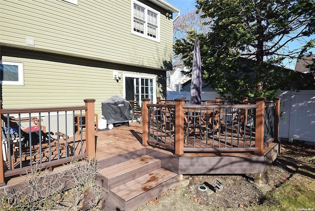 1070 Mckinley St, Baldwin, NY 11510 - wooden terrace featuring a grill
