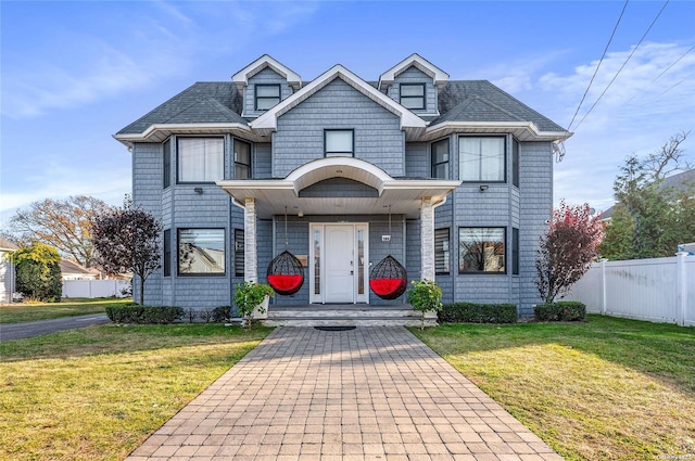 front facade with a front yard