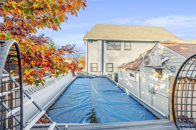 view of pool with ac unit