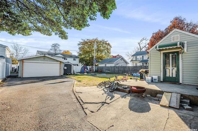 exterior space with an outdoor structure and a garage