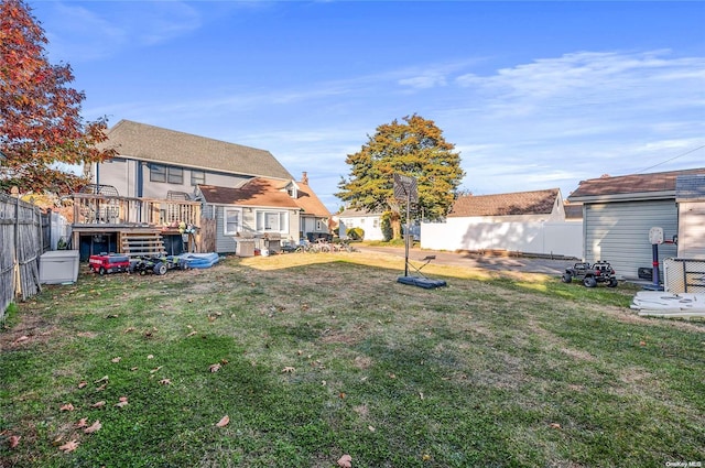 view of yard featuring a wooden deck