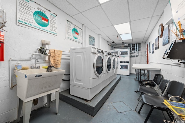 clothes washing area featuring washing machine and dryer