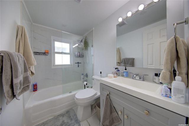 full bathroom featuring vanity, bath / shower combo with glass door, and toilet