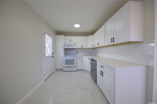 kitchen featuring white cabinets, backsplash, white appliances, and sink