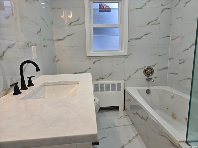 bathroom with radiator, vanity, a relaxing tiled tub, tile walls, and toilet