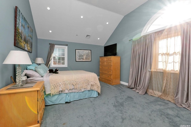 bedroom featuring carpet flooring and vaulted ceiling