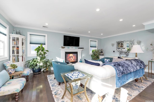 living room with ornamental molding and dark wood-type flooring