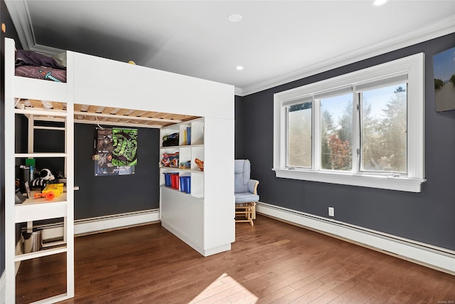 unfurnished bedroom with ornamental molding, baseboard heating, and dark wood-type flooring