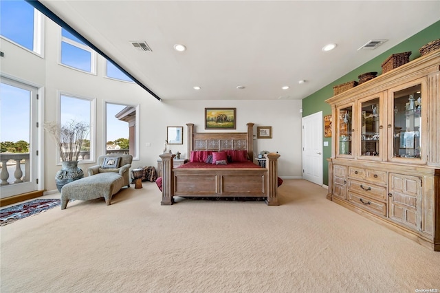 carpeted bedroom featuring access to outside