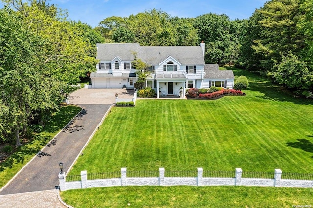 1345 Harbor Rd, Hewlett Harbor, NY 11557 - shingle-style home with driveway, a balcony, an attached garage, a chimney, and covered porch