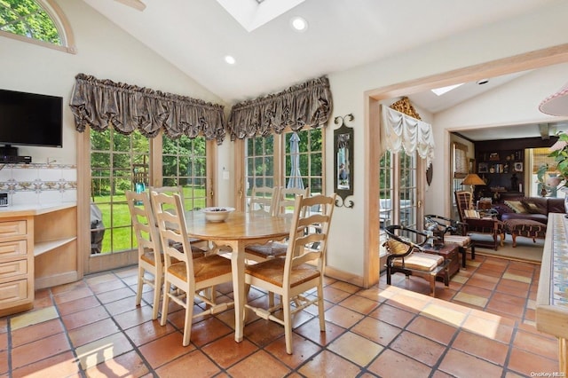 1345 Harbor Rd, Hewlett Harbor, NY 11557 - dining area with a skylight, vaulted ceiling, plenty of natural light, and recessed lighting