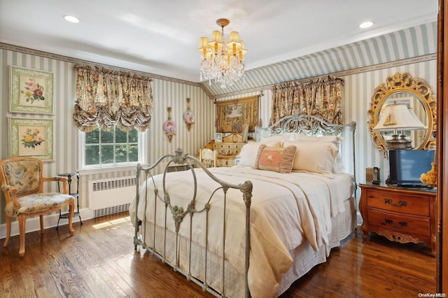 bedroom featuring crown molding, radiator heating unit, dark hardwood / wood-style floors, and a notable chandelier