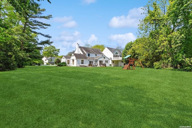 view of yard with a playground