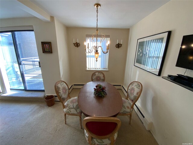 5 Schenck Ave Unit 3E, Great Neck, NY 11021 - dining room featuring carpet, plenty of natural light, a chandelier, and baseboard heating