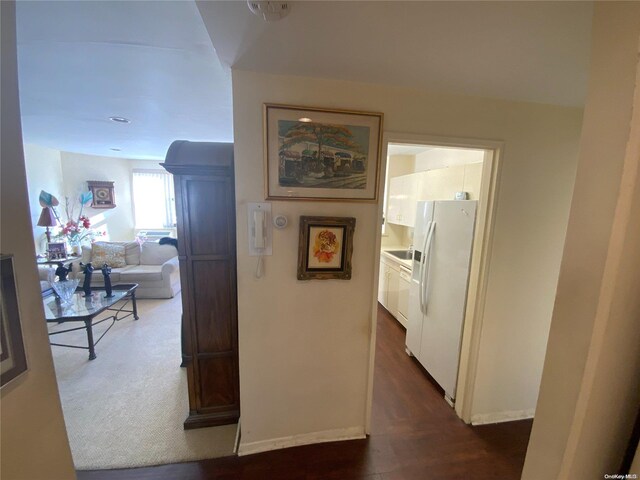 5 Schenck Ave Unit 3E, Great Neck, NY 11021 - hallway with dark wood-style flooring and baseboards