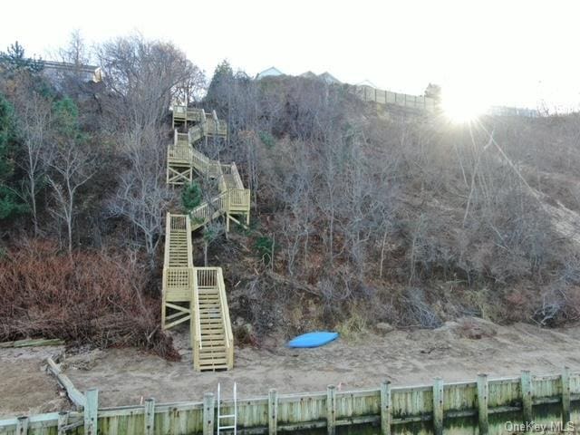 view of jungle gym featuring a water view