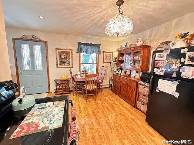 dining room with light wood-type flooring