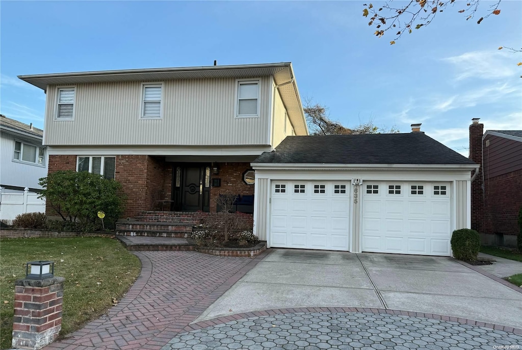 front of property featuring a garage