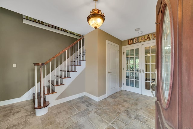 entrance foyer featuring french doors