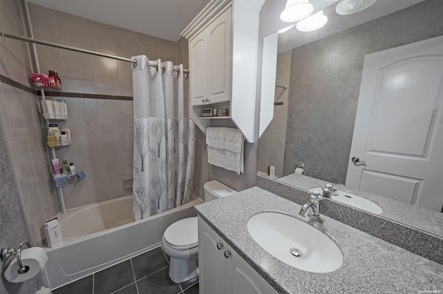 full bathroom with vanity, toilet, tile patterned flooring, and shower / bath combo with shower curtain