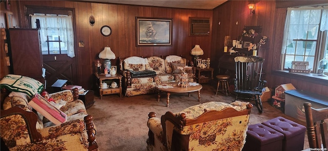 living room with wooden walls and carpet