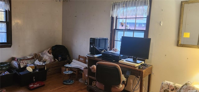 home office featuring hardwood / wood-style floors