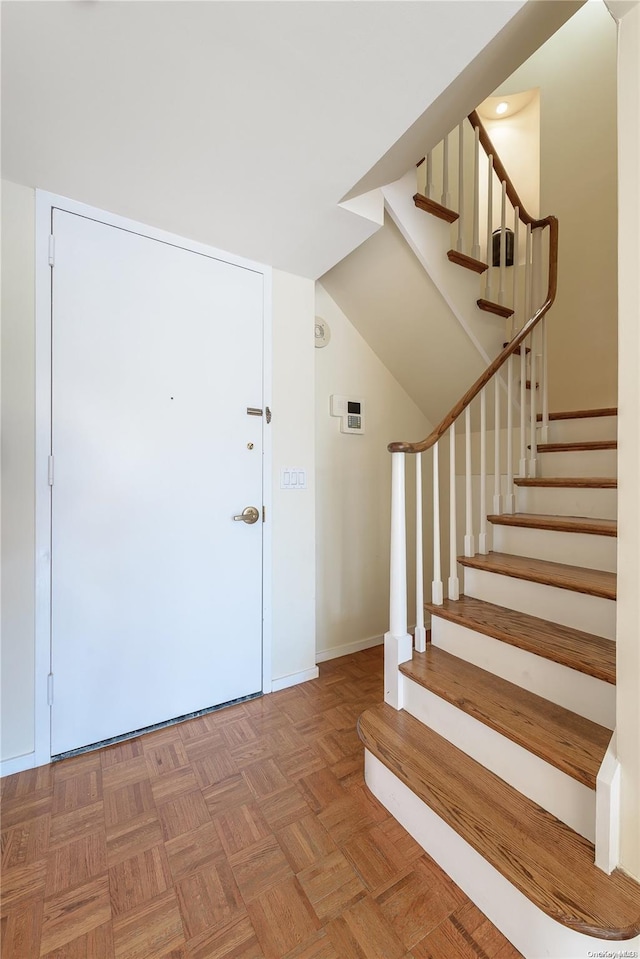 entrance foyer with parquet flooring