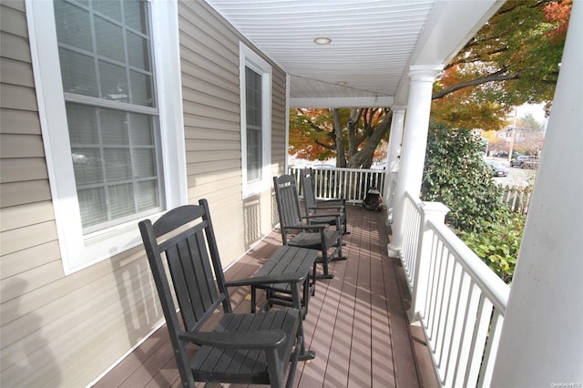 wooden terrace with covered porch