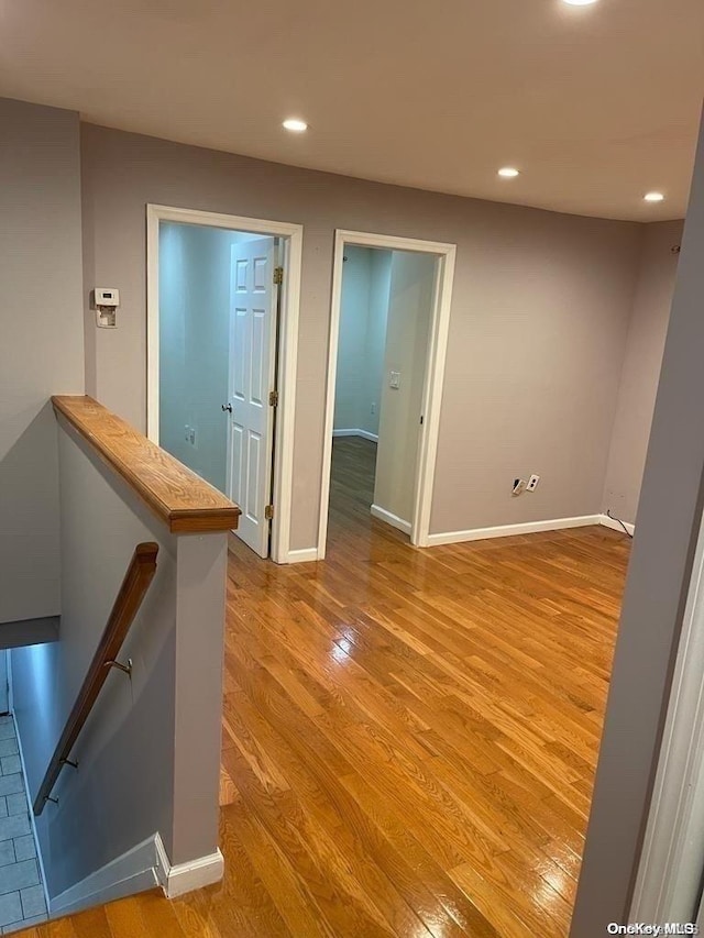 corridor featuring light wood-type flooring