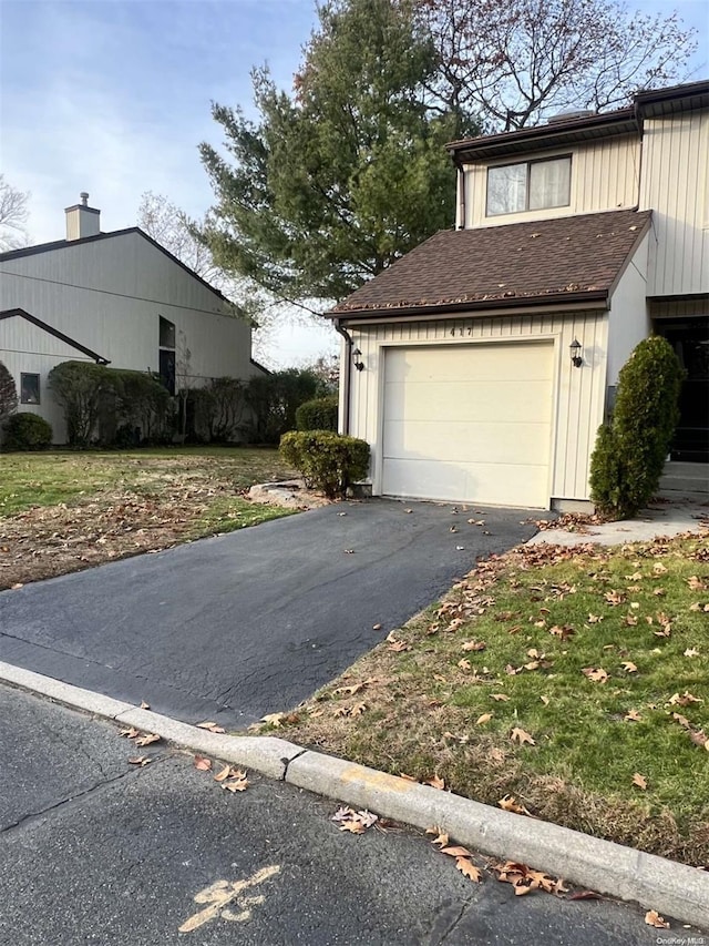 view of home's exterior with a garage